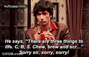 Man In Suit And Red Shirt Talking To Another Man GIF