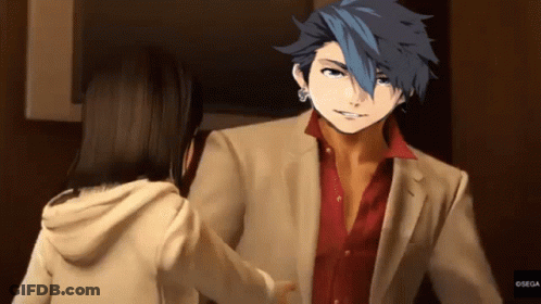 Man In Suit And Red Shirt Talking To Woman In Hoodie GIF