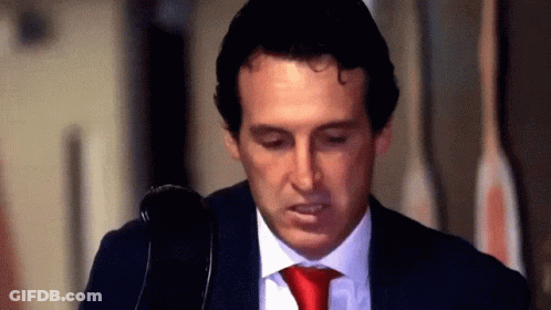 Man In Suit And Red Tie Looking Down GIF