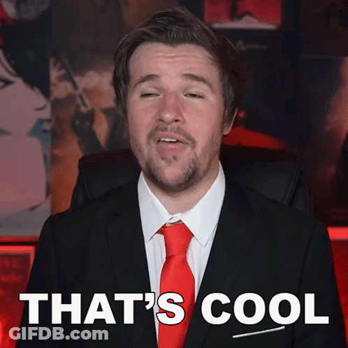 Man In Suit And Red Tie Saying That's Cool GIF