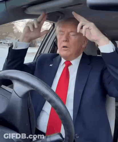Man In Suit And Red Tie Sitting In Car GIF