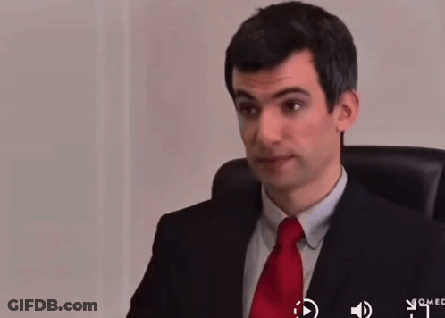 Man In Suit And Red Tie Smiling GIF