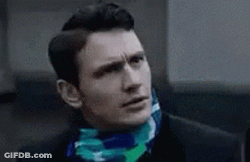 Man In Suit And Scarf Looking Up GIF