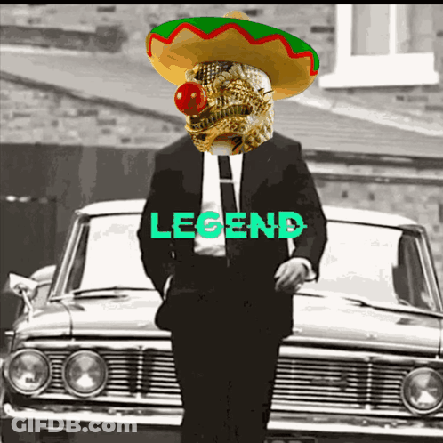Man In Suit And Sombrero Standing In Front Of Car With Legend GIF