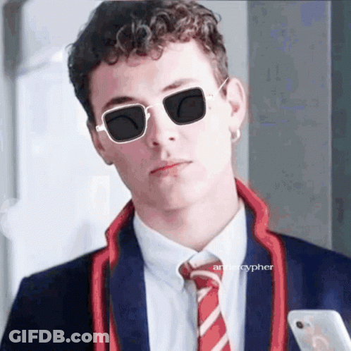 Man In Suit And Sunglasses Holding Cell Phone GIF