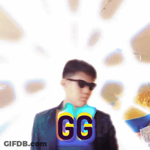 Man In Suit And Sunglasses In Front Of GG Sign GIF