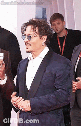 Man In Suit And Sunglasses On Red Carpet GIF