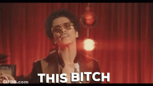 Man In Suit And Sunglasses Saying This Bitch GIF