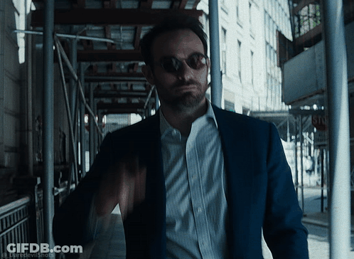 Man In Suit And Sunglasses Walking GIF