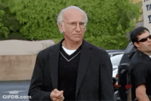 Man In Suit And Sweater, Sunglasses Man Behind GIF