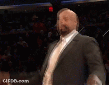 Man In Suit And Tie Arms Out GIF