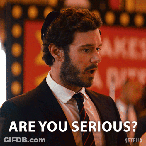 Man In Suit And Tie Asking If Serious GIF