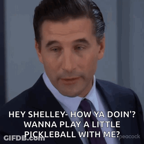 Man In Suit And Tie Asking Shelley To Play Pickleball GIF