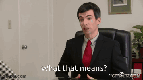 Man In Suit And Tie Asking What That Means GIF