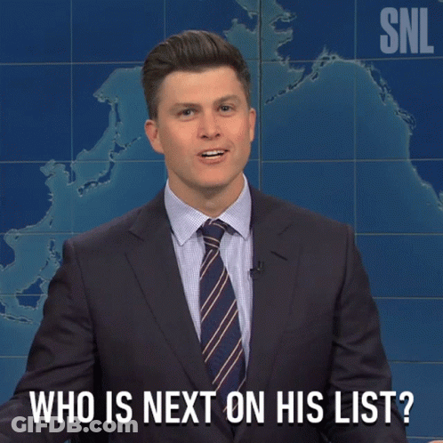 Man In Suit And Tie Asking Who Is Next GIF