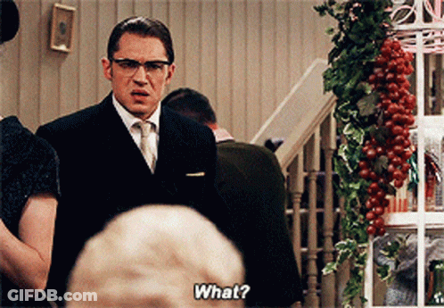 Man In Suit And Tie Asks What GIF