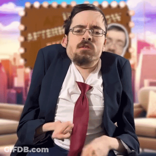 Man In Suit And Tie At Afterdark Sign GIF