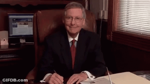 Man In Suit And Tie At Computer GIF