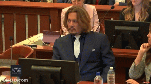 Man In Suit And Tie At Computer Saying Law Of Crime GIF