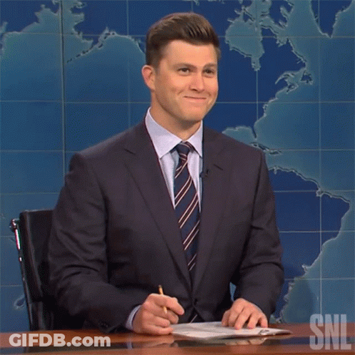Man In Suit And Tie At Desk GIF