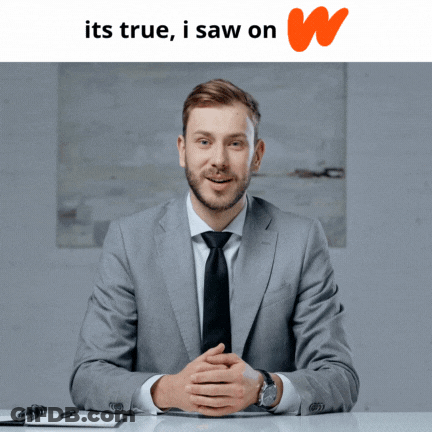 Man In Suit And Tie At Desk GIF