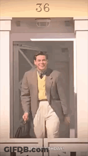 Man In Suit And Tie At Glass Door GIF