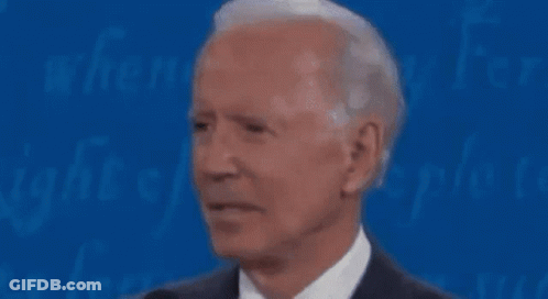 Man In Suit And Tie At Microphone GIF
