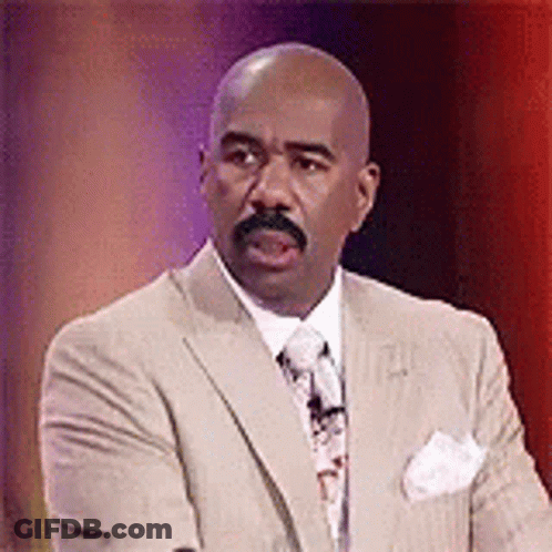 Man In Suit And Tie At Microphone GIF