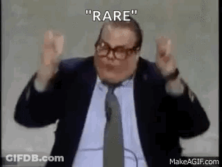 Man In Suit And Tie At Microphone GIF