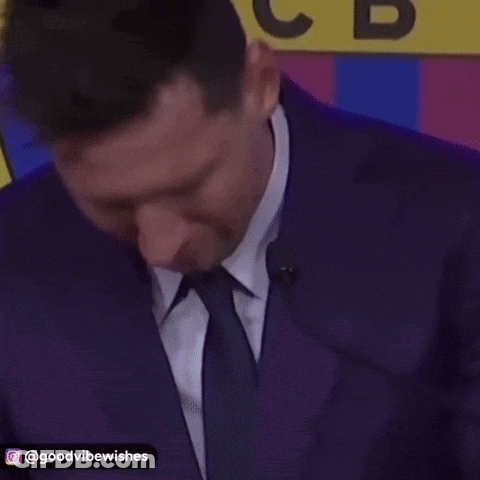 Man In Suit And Tie At Microphone GIF