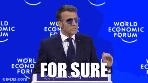 Man In Suit And Tie At Podium GIF