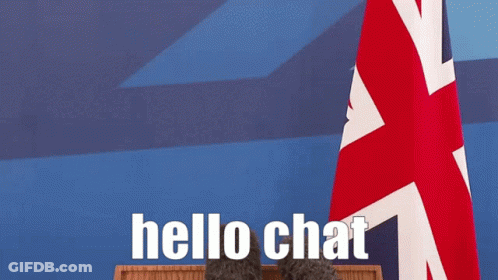 Man In Suit And Tie At Podium Hello Chat GIF