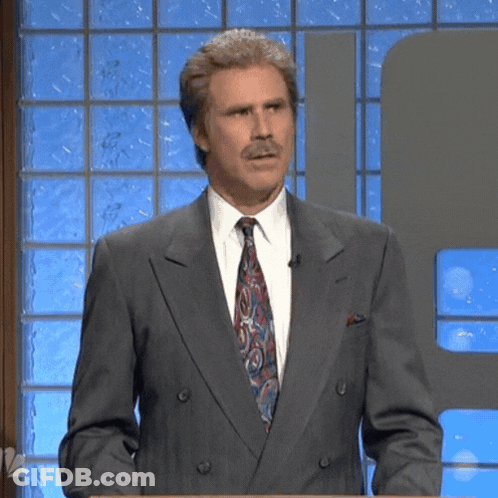 Man In Suit And Tie At Podium GIF