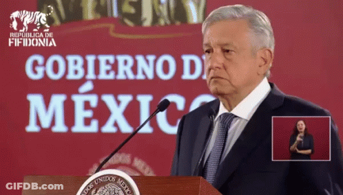 Man In Suit And Tie At Podium Saying Gobierno De Mexico GIF