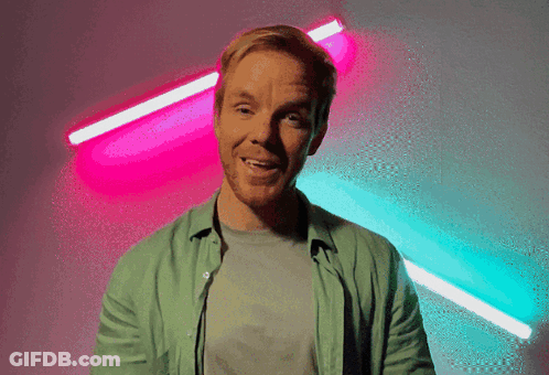 Man In Suit And Tie At Podium GIF