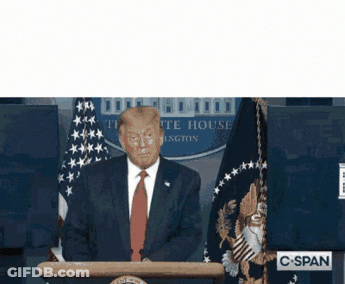 Man In Suit And Tie At Podium With White House Sign GIF