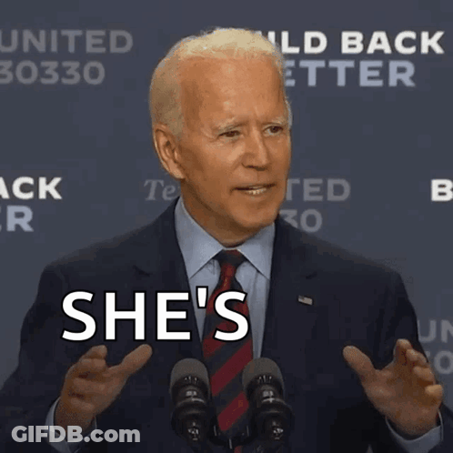 Man In Suit And Tie At Podium GIF