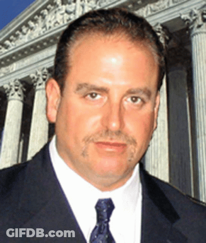 Man In Suit And Tie At Supreme Court GIF