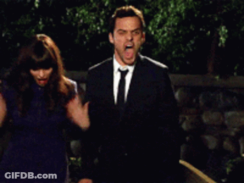 Man In Suit And Tie Attacked GIF