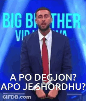 Man In Suit And Tie Before Big Brother VIP Sign GIF