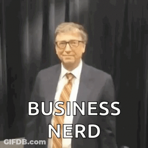Man In Suit And Tie Before Black Curtain GIF