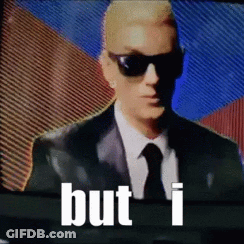 Man In Suit And Tie Before TV Saying But I GIF