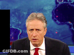 Man In Suit And Tie Before World Map GIF