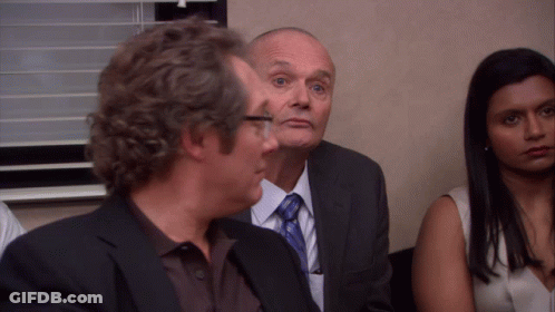 Man In Suit And Tie Beside Another Man GIF