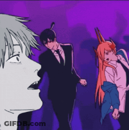 Man In Suit And Tie Beside Girl With Horns GIF