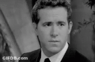 Man In Suit And Tie Black And White GIF