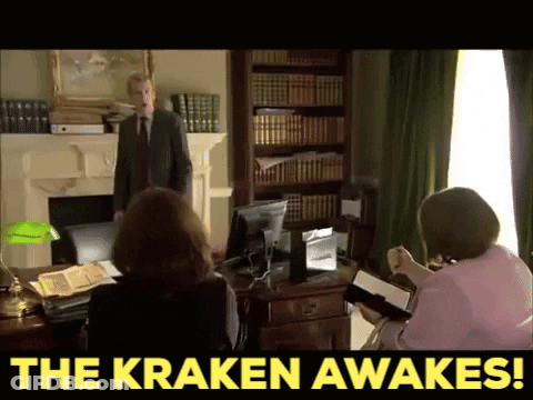 Man In Suit And Tie Bookshelf The Kraken Awakes GIF