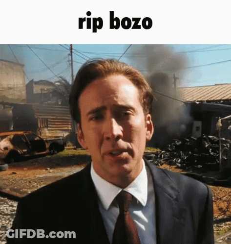 Man In Suit And Tie By Blue Wall 'Alaska 202 GIF