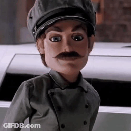Man In Suit And Tie By Ice Sign GIF