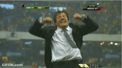 Man In Suit And Tie Celebrating At Mexico Scoreboard GIF